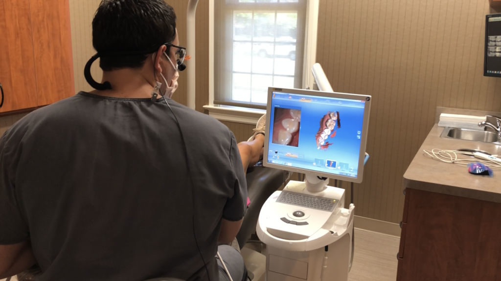 Dr. Kondorossy used digital technology while working with a patient on a restorative dentistry treatment in Richmond, VA.