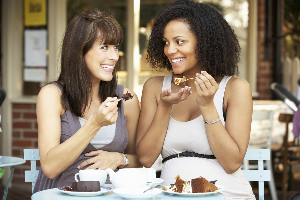 Two women enjoy desert at Buz and Ned's Real Barbecue in Richmond, VA. 